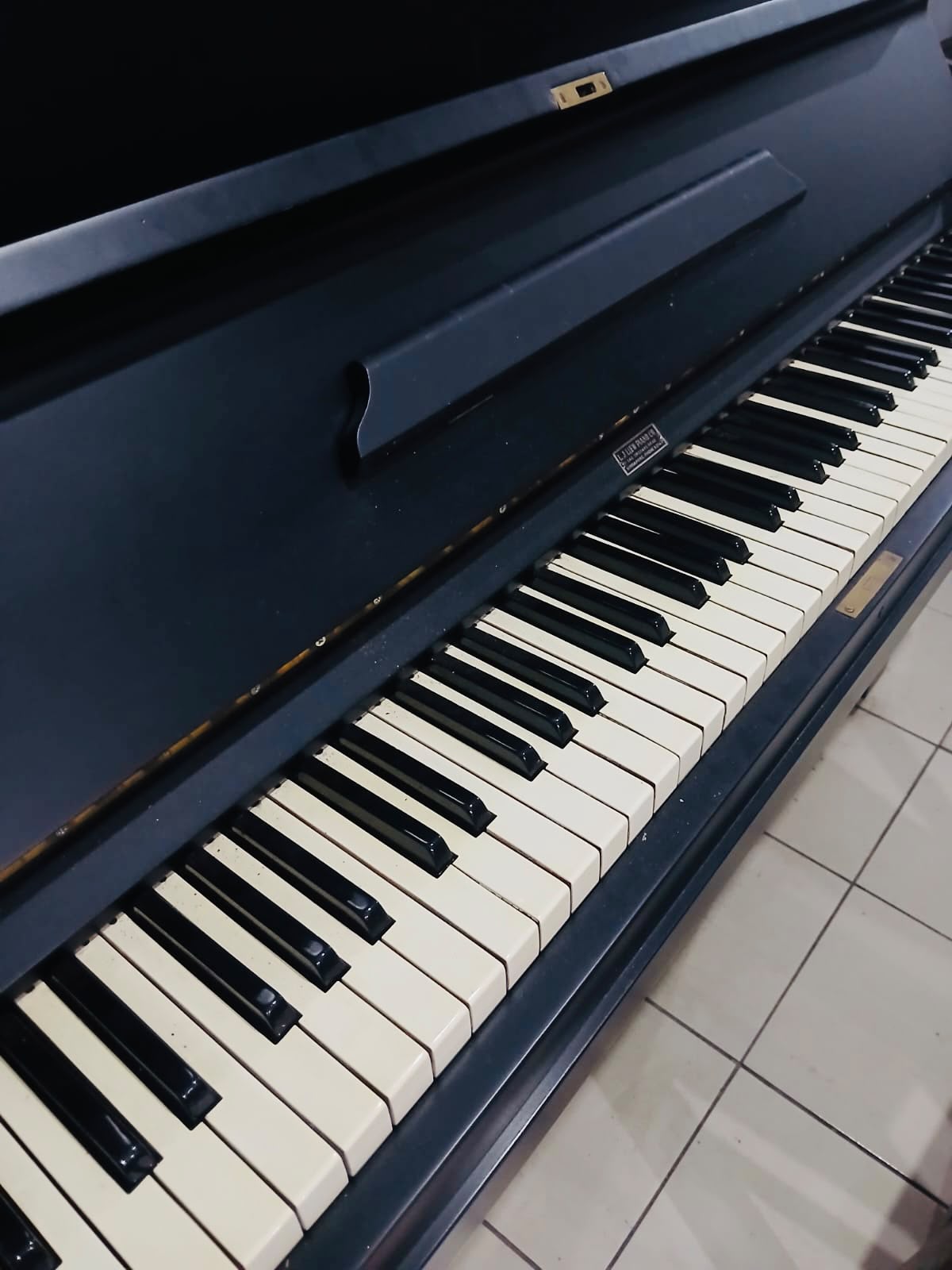 L.J. Liew pre-owned upright piano